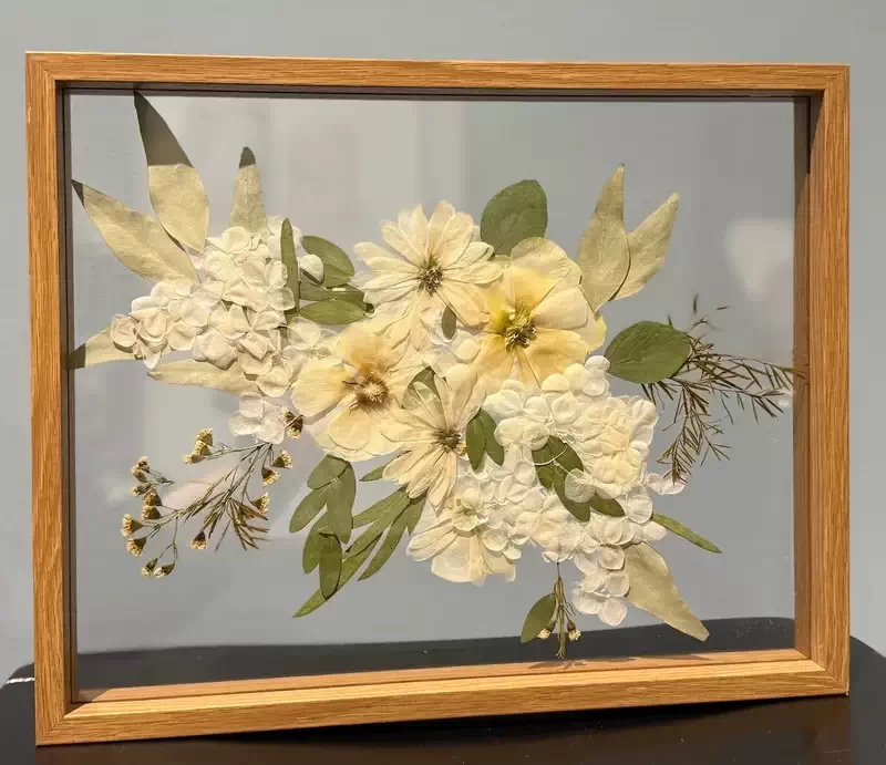  A wedding bouquet repurposed into wall art courtesy of Main Street’s Witch Hazel. Photo credit: Witch Hazel. 